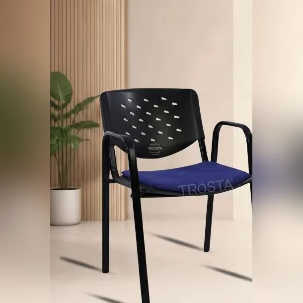 Sudam Prisma stackable visitor chair with perforated black back and blue seat